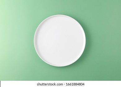 Empty Plate On Colour Background Top Stock Photo 1661884804 | Shutterstock