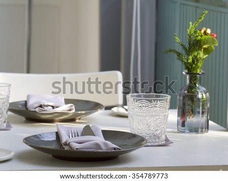 An empty plate on a table
