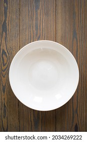 Empty Plate On Wooden Table