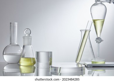 Empty platform for cosmetic bottle containers and scientific glassware. Herbal medicine natural organic and scientific glassware. Research and development concept.