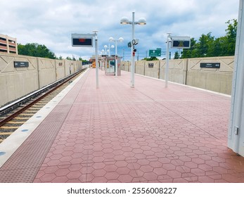  empty platform of an elevated subway station in Ashburn, Virginia.
