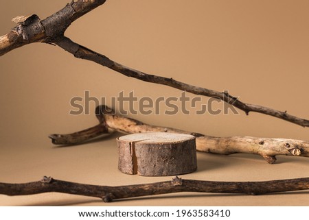 Empty podium of cylinder shape wood on beige background for product.