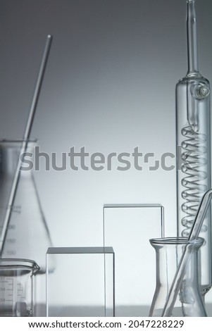 Empty podium glass for bottle containers. Research and develop  product concept with scientific glassware. 