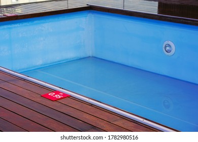 Empty Pool Without Water In Summer. Pool Of Blue Color Without Water