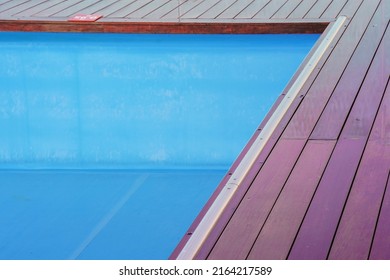 Empty pool without water in summer. Pool of blue color without water