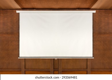 Empty Projector Screen On Wooden Wall