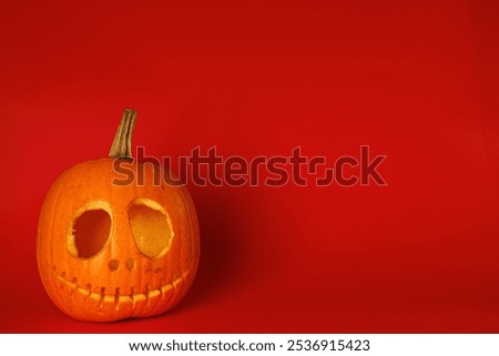 Empty Pumpkin head on red background. Halloween holiday concept