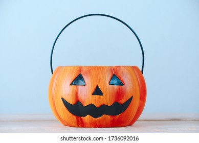 The empty pumpkin-shaped basket for children 's halloween party.  - Powered by Shutterstock