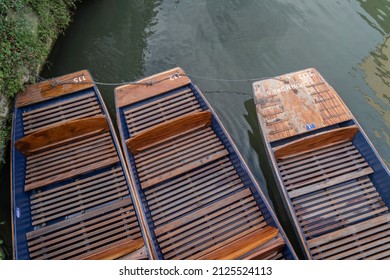 Empty punt boats on a cold Monday morning in Cambridge, UK. 14.02.22
