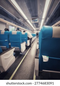 Empty Railway Corridor with Perspective Lines and Industrial Atmosphere.