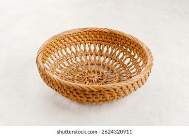 Empty rattan wicker basket. Close up, copy space