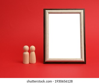 empty rectangular blank wooden frame, red background, copy space