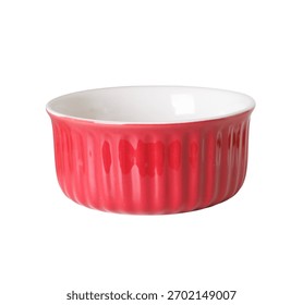 Empty red ceramic ramekin sauce cup isolated on a white background. This fluted, ribbed bowl is classic kitchenware for baking desserts, or serving dips, sauces, and ingredients.