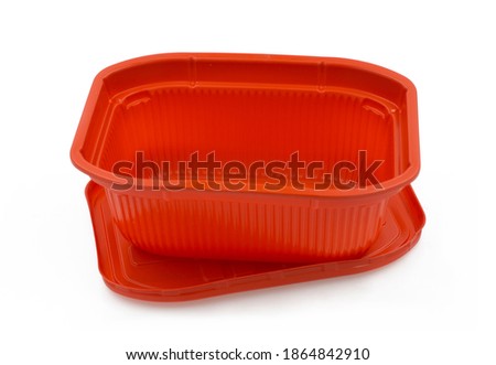 Empty red plastic disposable lunch box isolated on 

white background
