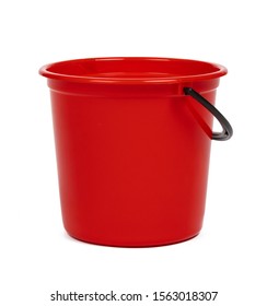 empty red plastic household bucket on a white background