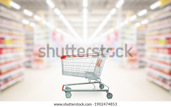 empty red shopping cart\
in supermarket