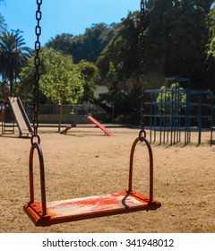 Empty red swing