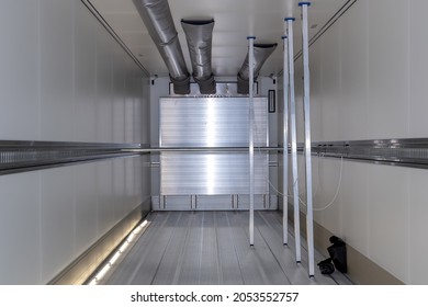 Empty Refrigerated Truck Inside, With Cargo Area Lighting. Interior Of Van For Transporting Frozen Food