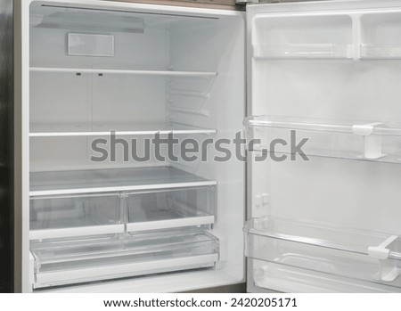 empty refrigerator with door open