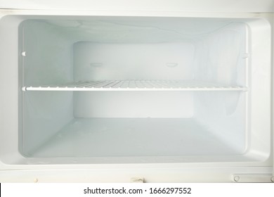 Empty Refrigerator Or Freezer With Copy Space. 