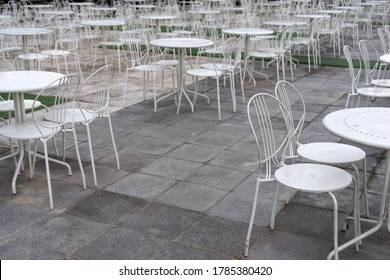 Empty Restaurant And Cafe Tables.  No People. Restaurant Business Recession. Blurred Photo With Soft Focus.