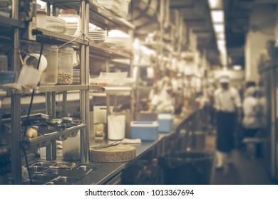 Empty Restaurant Kitchen Is Blurred For Background