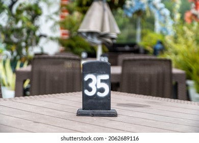 Empty Restaurant Table Number 35. Selective Focus