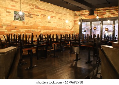 Empty restaurant in Toronto during coronavirus covid-19 pandemic, Canada - Shutterstock ID 1679692738