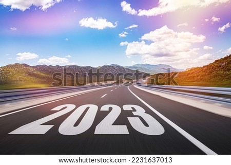 Empty road asphalt and New year 2023 concept. What will the coming year 2023 bring.