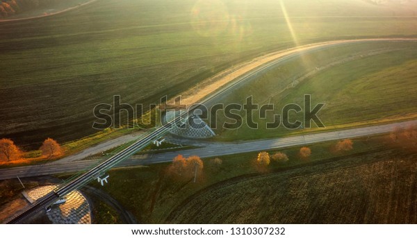 Empty road for cars aerial view from top around\
green nature