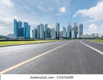 Empty Road With City Skyline In Singapore