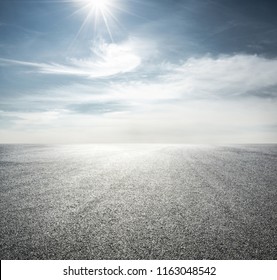 empty road with cloudy sky background