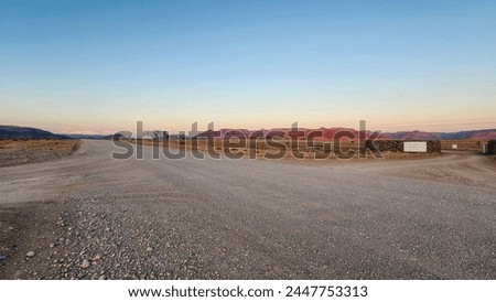 Similar – Image, Stock Photo Desert road in mountains under cloudy sky