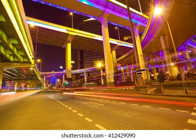 Empty road floor with city elevated bridge of night scene