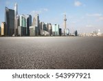 Empty road floor surface with modern city landmark buildings of Shanghai bund Skyline 