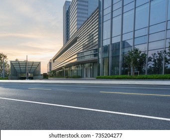 empty road with modern buildings on background,shanghai,china. - Powered by Shutterstock