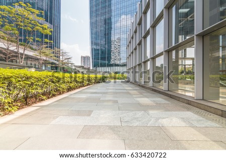 Empty road and modern business buildings