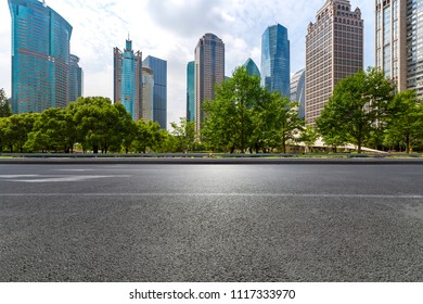 Empty Road with modern business office building - Shutterstock ID 1117333970