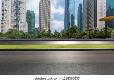 Empty Road with modern business office building - Shutterstock ID 1124380835