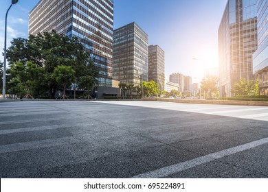 Empty Road with modern business office building 
 - Shutterstock ID 695224891