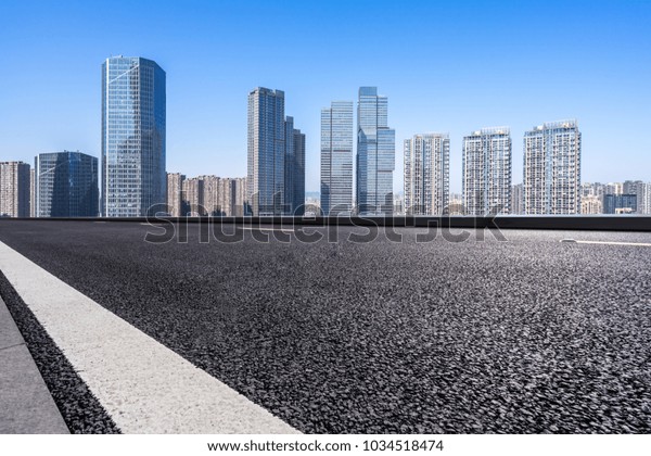 empty road with modern
office building