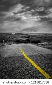 An empty road to nowhere. A quiet desolate road in the Derbyshire Peak District National Park, 