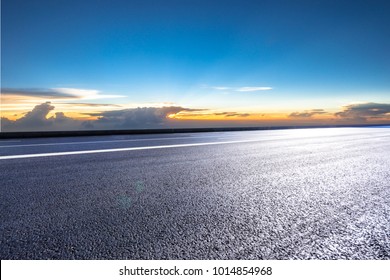 empty road with panoramic cityscape - Powered by Shutterstock