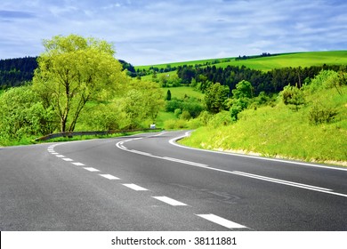 Empty Road In Rural Landscape