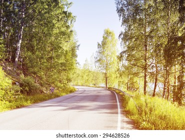 An Empty Road In The Summer Time. Image Has A Vintage Effect.