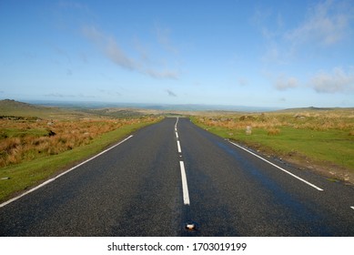 Empty road through Dartmoor National Park in the summer, Devon, England