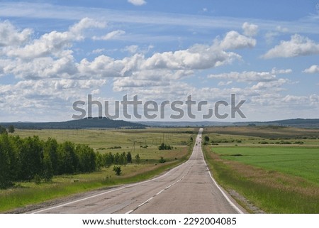 Empty road through the fields of Bashkortostan