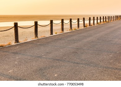 The empty road under the warm sun