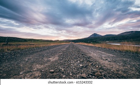 Empty road at westfjord as sunset , Iceland