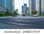 empty road with zebra crossing and skyscrapers in modern city